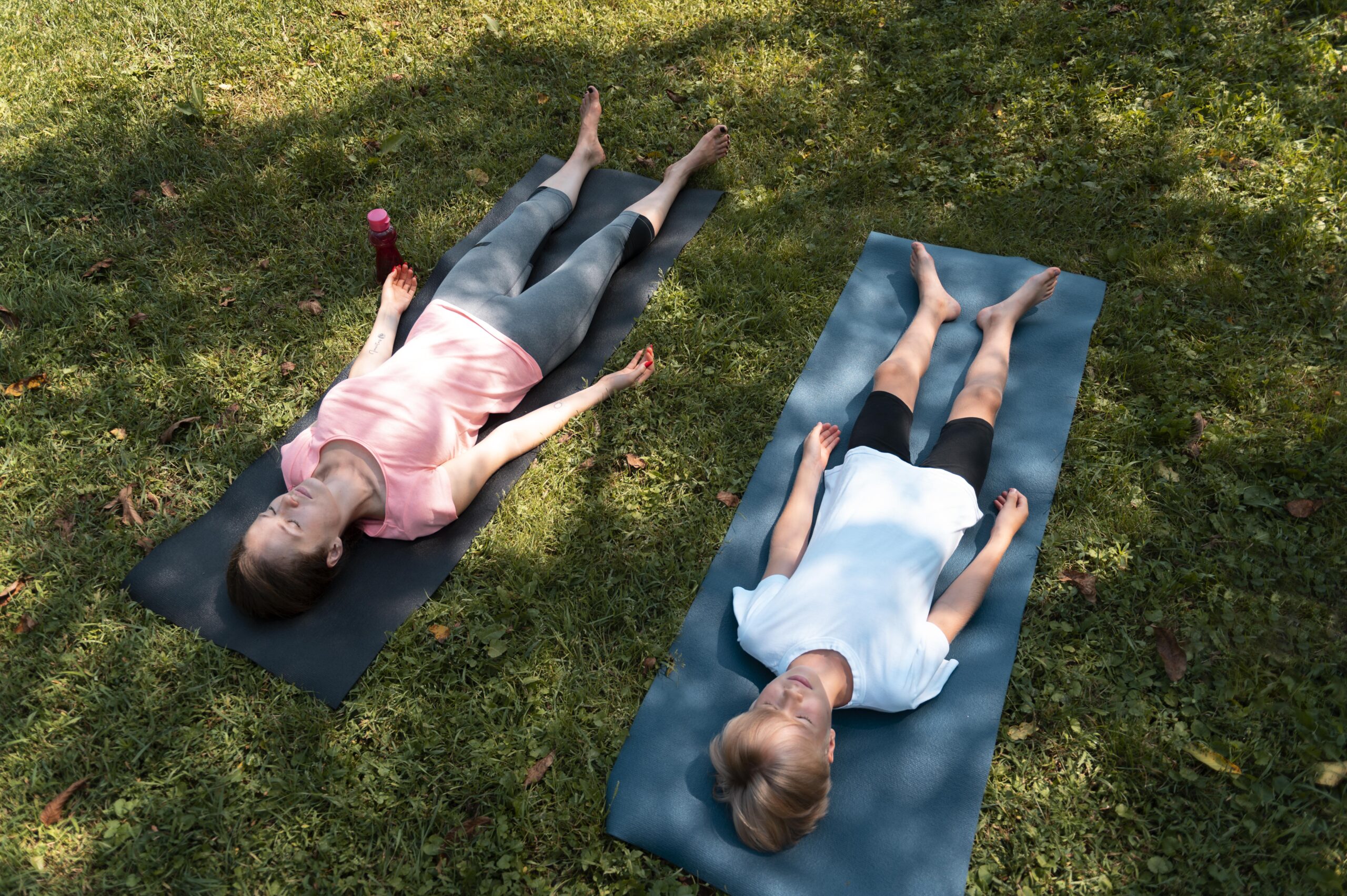 woman-child-doing-yoga-full-shot